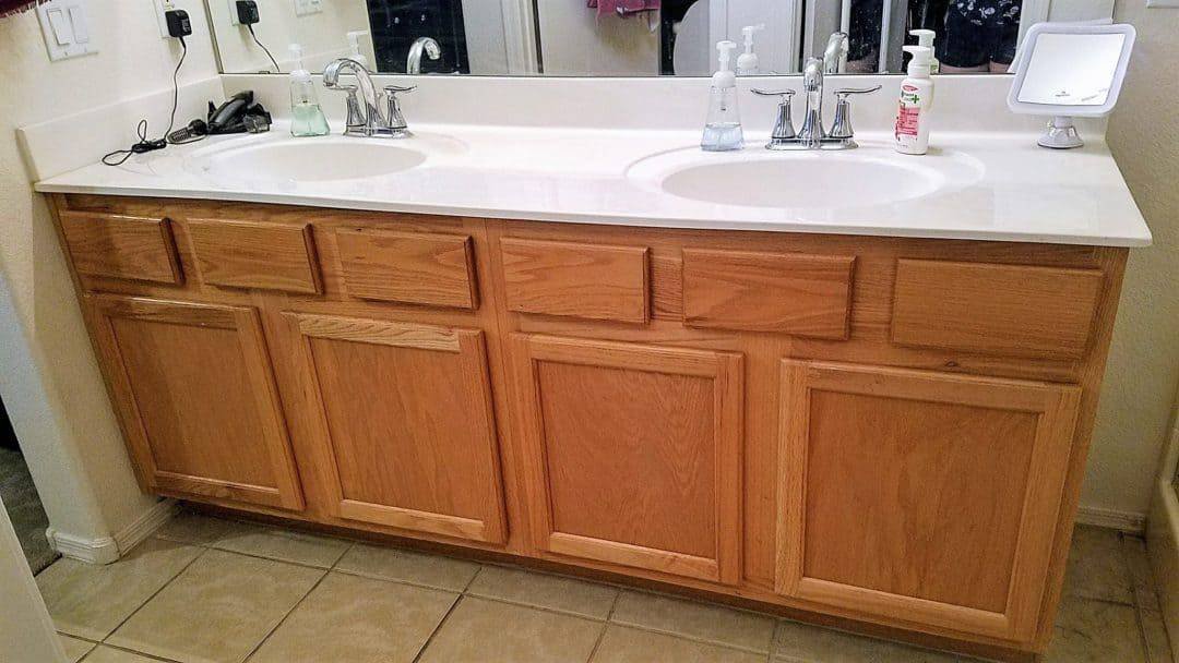 These ugly oak cabinets were throughout the whole house. So dated!