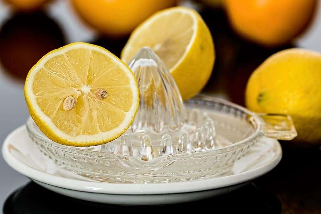 Lemon is a natural cleaning and bleaching agent. But it might ruin your dye job!